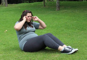 young woman doing crunches