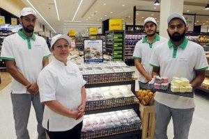 Countdown Ponsonby bakery staff Inga Philbert, Dijoy Joseph, Gagandeep Singh and Jac George with Lamingtons. Porter Novelli photoshoot for Countdown. 27 June 2016. Copyright Image: William Booth / www.photosport.nz